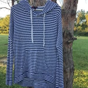 Small, comfy striped, blue sweater. Super soft.